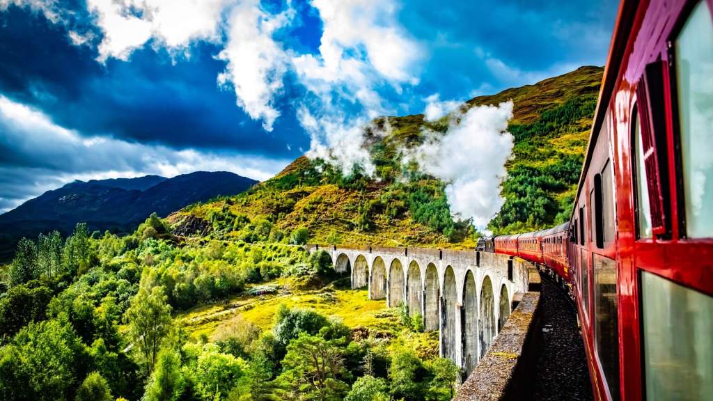 West Highland Line scenic train journey in Scotland crossing the Glenfinnan Viaduct